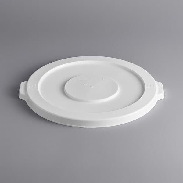 A white plastic lid with a circle on it.