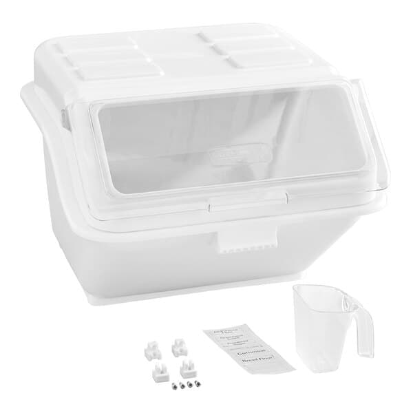 A white plastic Baker's Lane ingredient bin with a clear lid and accessories.