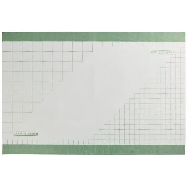 A white and green rectangular silicone mat with a grid pattern.