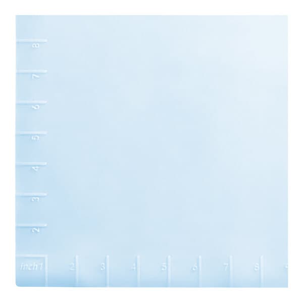 A blue translucent silicone work mat with white numbers on it.