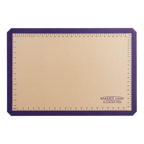 A rectangular baking mat with a purple border.