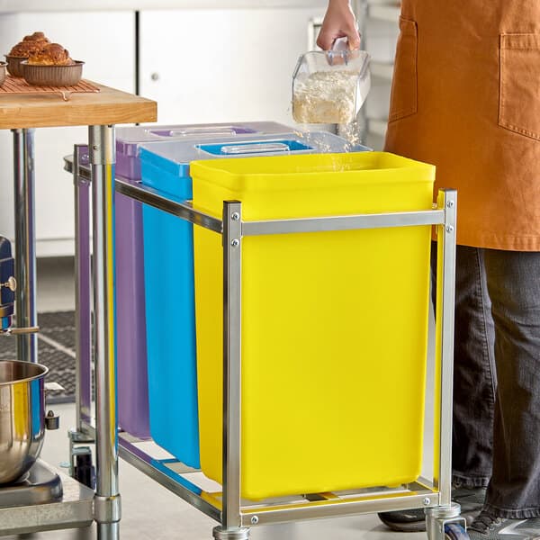 A yellow 10-gallon ingredient bin with a lid, designed for kitchen storage and organization.
