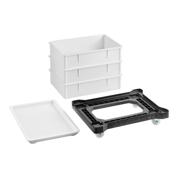 A white dough proofing set with three stackable bins, a matching lid, and a black plastic dolly with wheels.