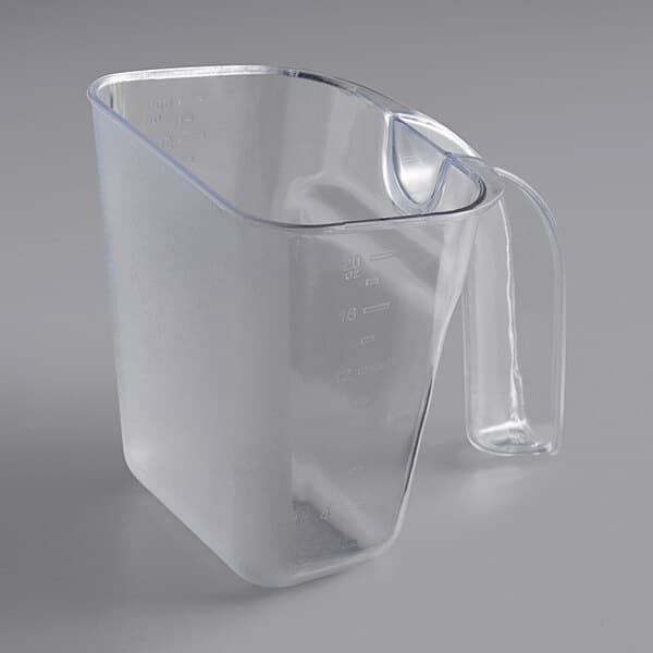 A clear plastic utility and ice scoop with a handle.