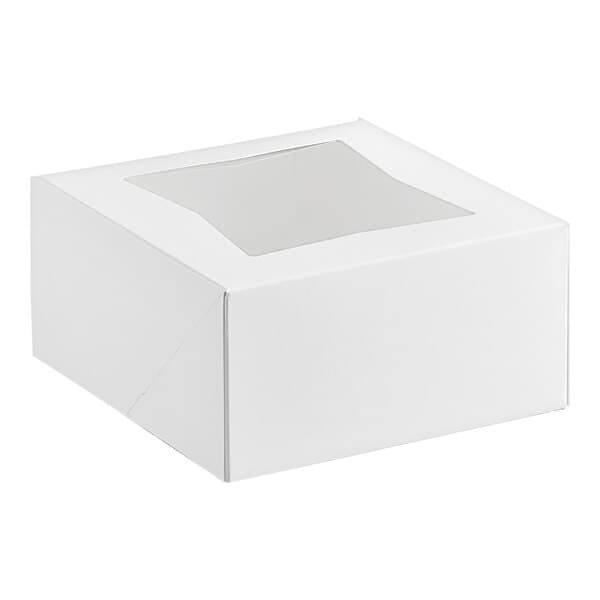 A white bakery box with a clear window on top, measuring 6 by 6 by 3 inches.