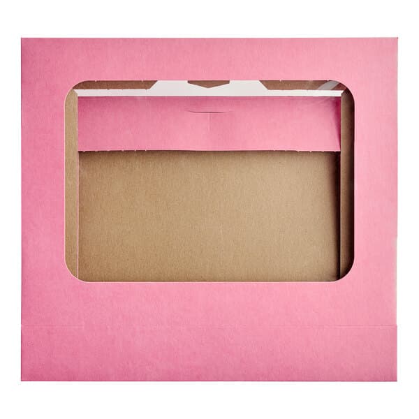 A pink Baker's Mark bakery box with a window.