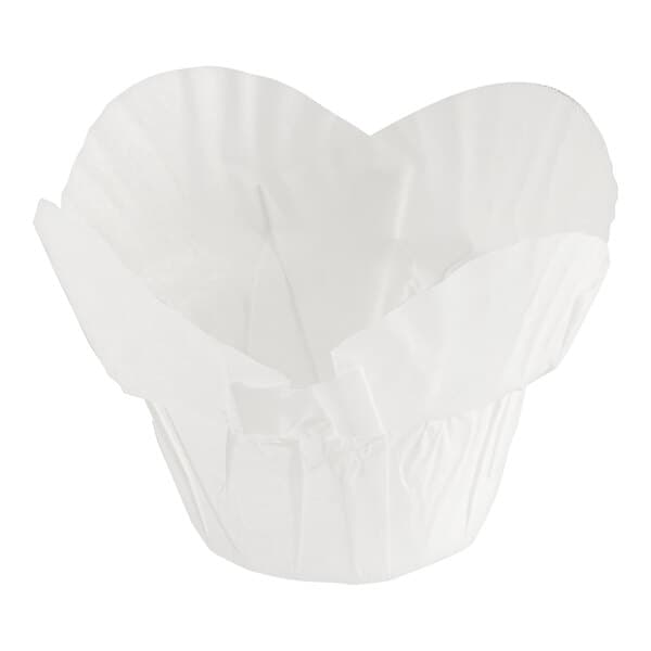 A close-up of a white Baker's Mark paper cupcake liner with a rounded bottom.