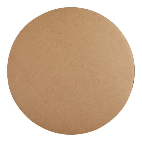 A round, brown corrugated cake circle used for supporting cakes.