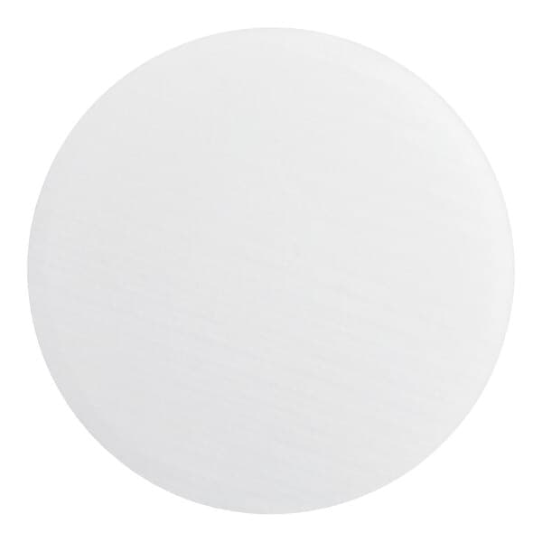 A round, white, corrugated grease-resistant cake circle.