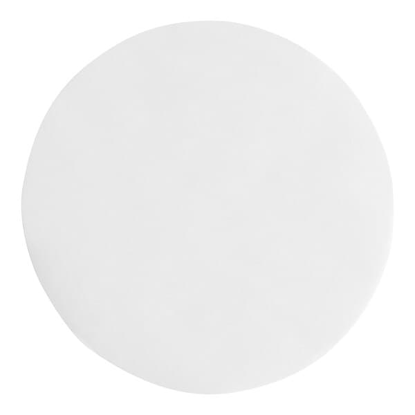 A white circle of Baker's Lane Quilon-coated parchment pan liners.