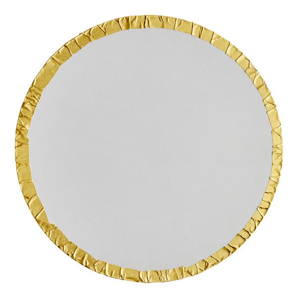 A round white and gold plate with a gold foil surface.