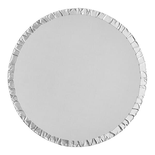 A round silver cake drum with a white background and silver edge.