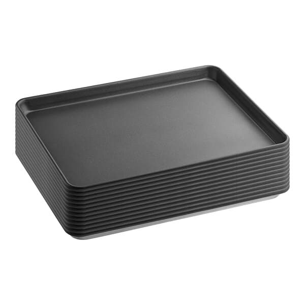 A stack of Baker's Lane black wire in rim sheet pans.