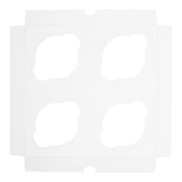 A white cardboard cupcake insert with four cut-out spaces designed to hold standard-sized cupcakes in an 8 x 8 inch box.